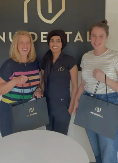 Dr Attiya Ahmed with patients at Nu Dentalign